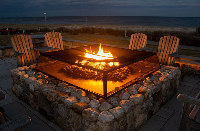 Adding a Fire Pit or Fireplace: Cozy up Your Outdoor Space
